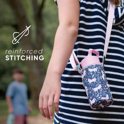 Child wearing navy striped shirt holding Simple Modern water bottle carrier in soft pink and light blue with adjustable sling strap for convenient carrying.