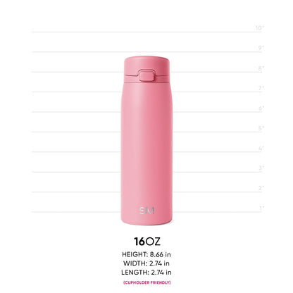 Soft dusty pink tumbler with white text on neutral gray background, featuring metallic accents