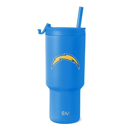 Bright blue tumbler with golden yellow accents